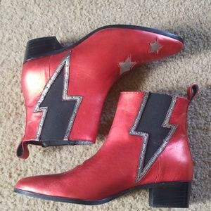 Lightning bolt star boots, by Modern vice
